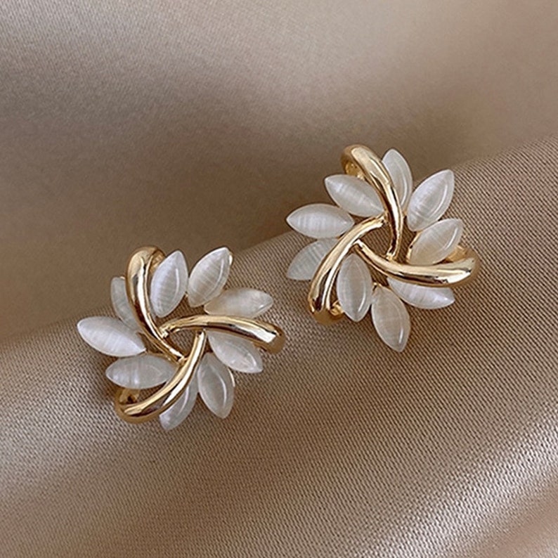 Exquisite Flower Zircon Stud Earrings" "Elegant Design Women's Earrings" "Christmas Party and Everyday Wear Accessories" "Dainty Handcrafted Zircon Earrings" "Sparkling Flower Statement Studs"