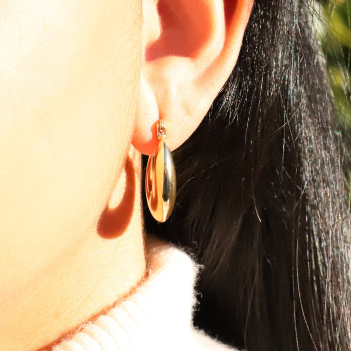 Close-up of French Retro Gold Plated Chunky Hoop Earrings on a white background.