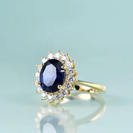 Side view of Princess Diana Inspired Blue Sapphire Ring showing the 14K gold filled sterling silver band.