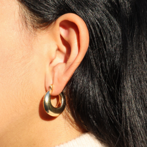 Model wearing French Retro Gold Plated Chunky Hoop Earrings.