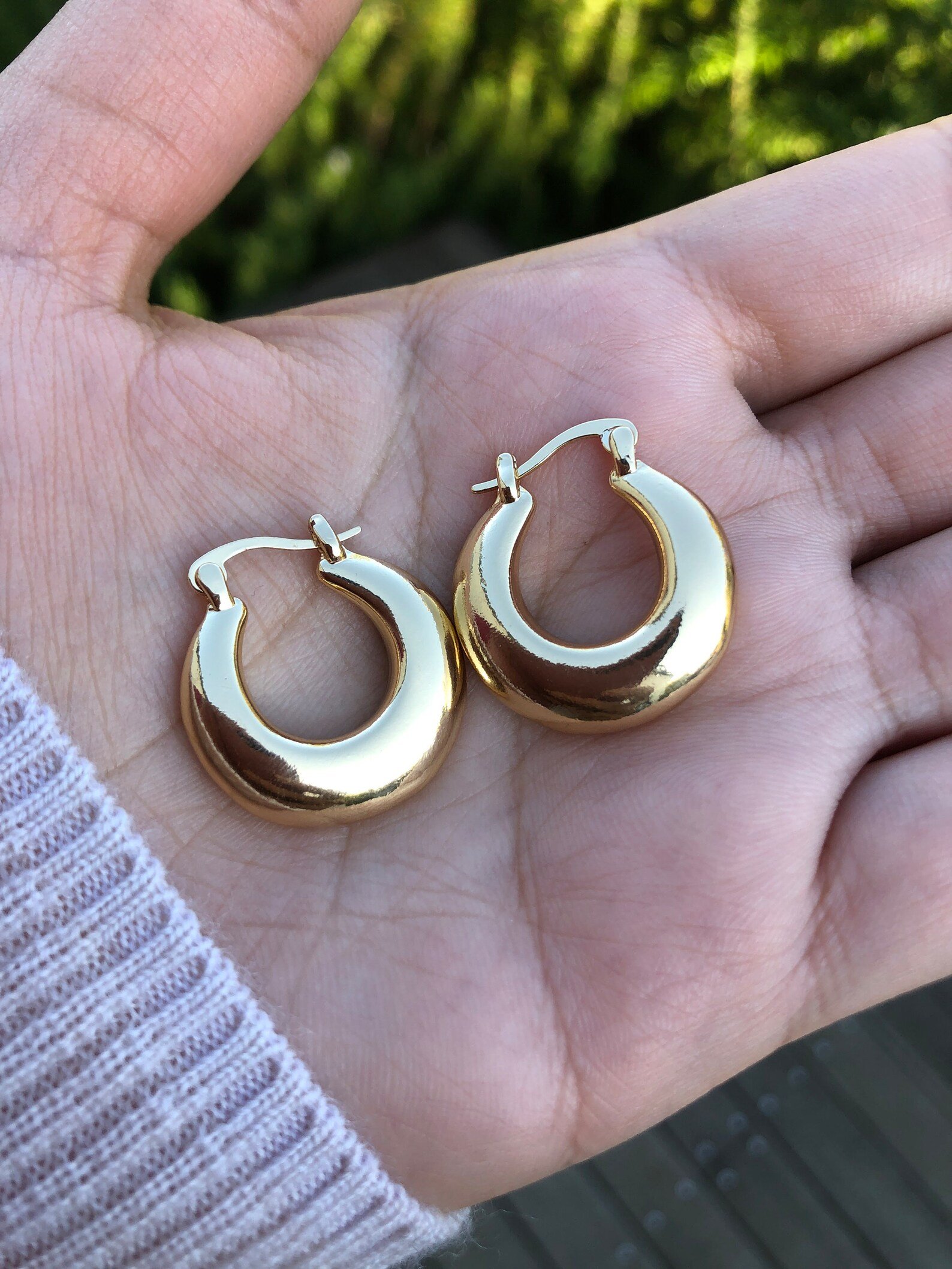 French Retro Gold Plated Chunky Hoop Earrings displayed on a jewelry stand.